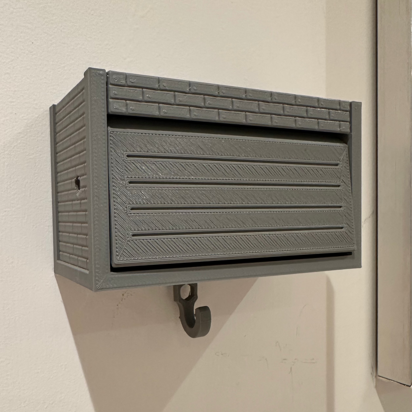 Pop up garage key holder